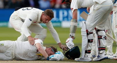 langer says smith blow may see neck guards become compulsory langer says smith blow may see neck guards become compulsory