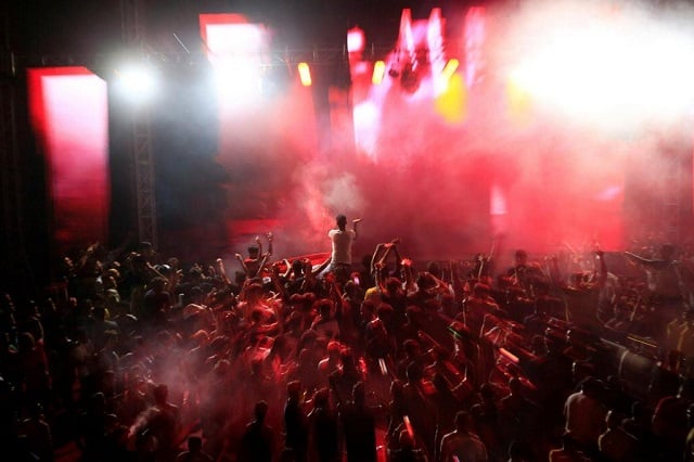 young people dance as they attend electronic music concert with western tunes at closed hall in shaab stadium for the first time in baghdad iraq august 16 2019 photo reuters