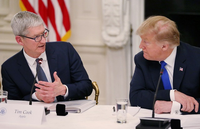 apple ceo tim cook talks with us president donald trump as they participate in an american workforce policy advisory board meeting in the white house state dining room in washington us march 6 2019 photo reuters apple ceo tim cook talks with us president donald trump as they participate in an american workforce policy advisory board meeting in the white house state dining room in washington us march 6 2019 photo reuters