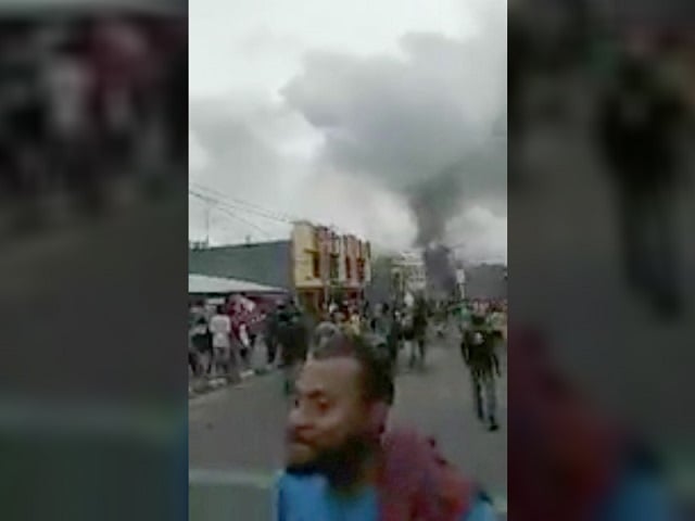 smoke rises during a protest as demonstrators set fire to tyres and torched a local parliament building in indonesia 039 s easternmost province of papua august 19 2019 in this picture obtained from social media photo reuters