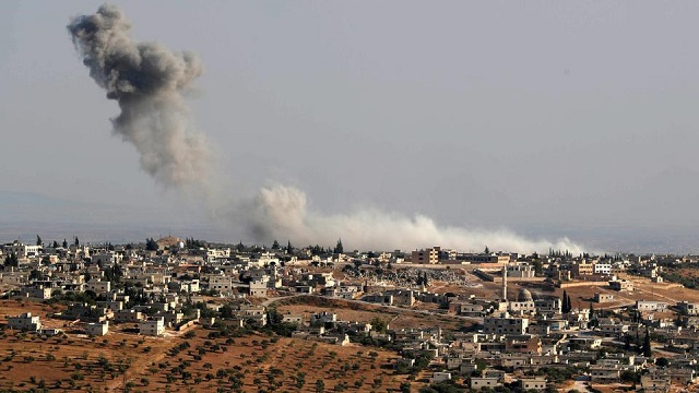 smoke billows following reported regime air strikes on the village of kafr sajna in the southern outskirts of syria 039 s idlib province on august 16 2019 photo afp