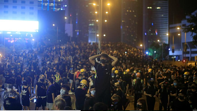 anti extradition bill protesters march to demand democracy and political reforms in hong kong photo reuters anti extradition bill protesters march to demand democracy and political reforms in hong kong photo reuters