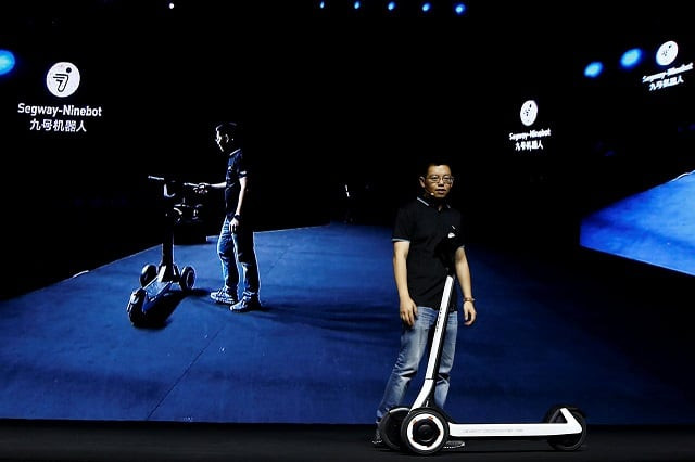 ninebot president wang ye unveils semi autonomous scooter kickscooter t60 that can return itself to charging stations without a driver at a segway ninebot product launch event in beijing china august 16 2019 photo reuters ninebot president wang ye unveils semi autonomous scooter kickscooter t60 that can return itself to charging stations without a driver at a segway ninebot product launch event in beijing china august 16 2019 photo reuters