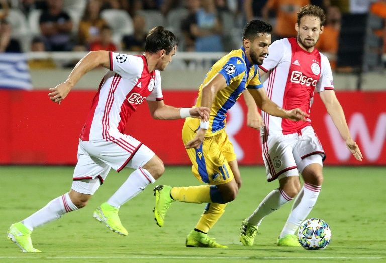 ajax finishes with 10 men and a goalless draw in cyprus