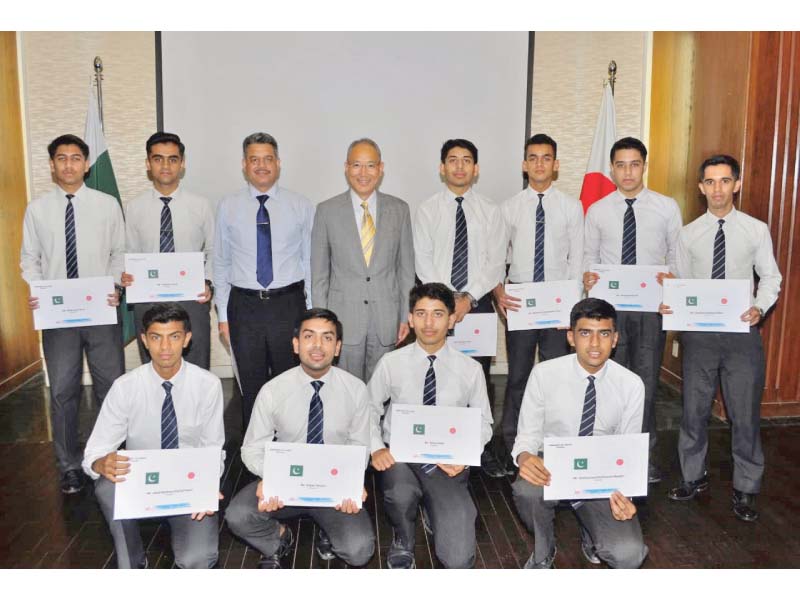 ten high school students from hasan abdal cadet college pose with their travel documents as they have been invited to japan under a youth exchange programme photo express