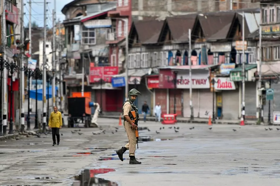 in this file photo taken on august 19 2019 an occupying force personnel patrols on a deserted road of the lal chowk area in srinagar photo afp in this file photo taken on august 19 2019 an occupying force personnel patrols on a deserted road of the lal chowk area in srinagar photo afp