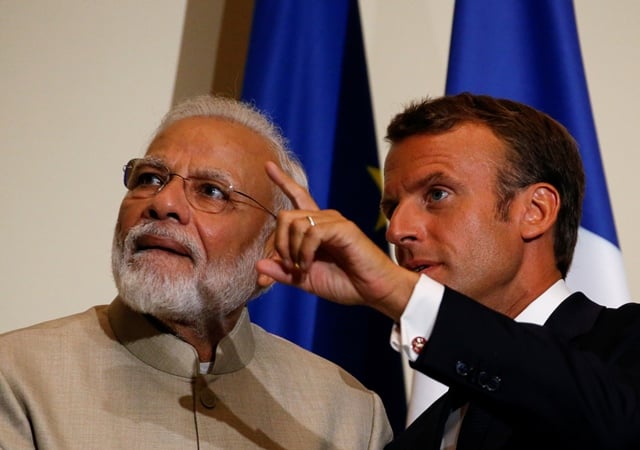 french president emmanuel macron gestures next to indian prime minister narendra modi after a joint statement at the chateau of chantilly photo reuters