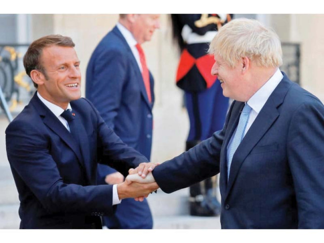 french prime minister macron with british prime minister boris johnson photo reuters french prime minister macron with british prime minister boris johnson photo reuters