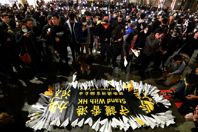 supporters of hong kong pro democracy protesters demonstrated at martin place in sydney photo afp supporters of hong kong pro democracy protesters demonstrated at martin place in sydney photo afp