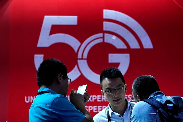 a sign advertising 5g is seen at ces consumer electronics show asia 2019 in shanghai china june 11 2019 photo reuters