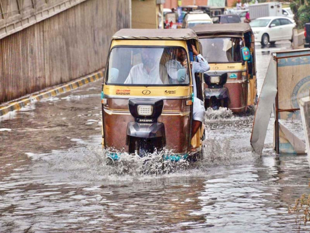commuters face difficulty plying on the road in front of the national institute of child health due to the overflowing sewerage water the same road houses some of the largest public hospitals of the province several areas of the city have been affected by overflowing sewerage water after the recent rains photo app commuters face difficulty plying on the road in front of the national institute of child health due to the overflowing sewerage water the same road houses some of the largest public hospitals of the province several areas of the city have been affected by overflowing sewerage water after the recent rains photo app