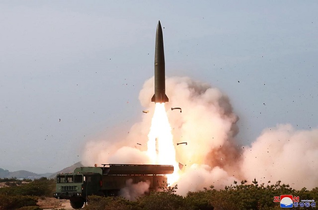 the missiles flew about 380 kilometres 240 miles and reached an altitude of 97 kilometres at a top speed of mach 6 5 before landing in the east sea also known as sea of japan it said photo reuters