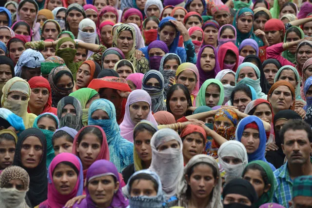 kashmiri mourners look on during the funeral of four civilians at aripanthan magam village in budgam district on the outskirts of srinagar on august 16 2016 photo afp file kashmiri mourners look on during the funeral of four civilians at aripanthan magam village in budgam district on the outskirts of srinagar on august 16 2016 photo afp file