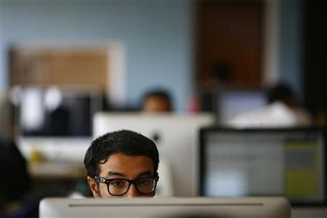 an employee works on his computer at the office of cloudfactory a canadian startup that based itself in kathmandu where it hires teams of nepalese october 5 2012 reuters file