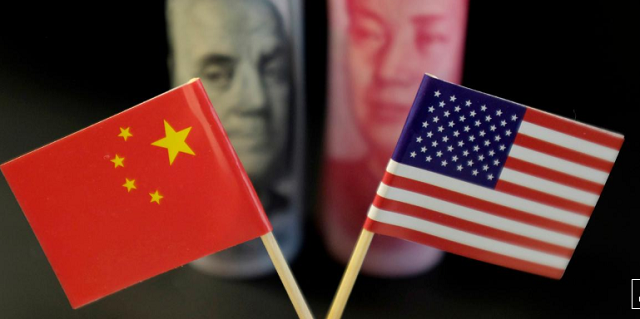 u s and chinese flags are seen in front of a u s dollar banknote featuring american founding father benjamin franklin and a china 039 s yuan banknote featuring late chinese chairman mao zedong in this illustration picture photo reuters