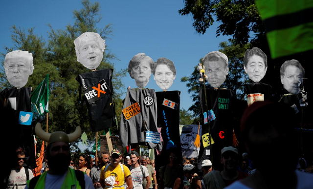 anti g7 protesters attend a protest march on the french spanish border in hendaye during the biarritz g7 summit france august 24 2019 photo reuters