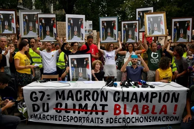 demonstrators at the so called quot portrait march quot were carrying official portraits of the 41 year old french leader photo express demonstrators at the so called quot portrait march quot were carrying official portraits of the 41 year old french leader photo express