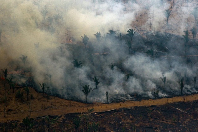 brazil s army fights amazon fires after hundreds more flare up