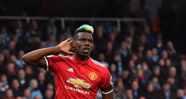 pogba 039 s message was accompanied by a photograph showing him holding his baby alongside portraits of his late father fassou antoine and civil rights activist martin luther king photo afp