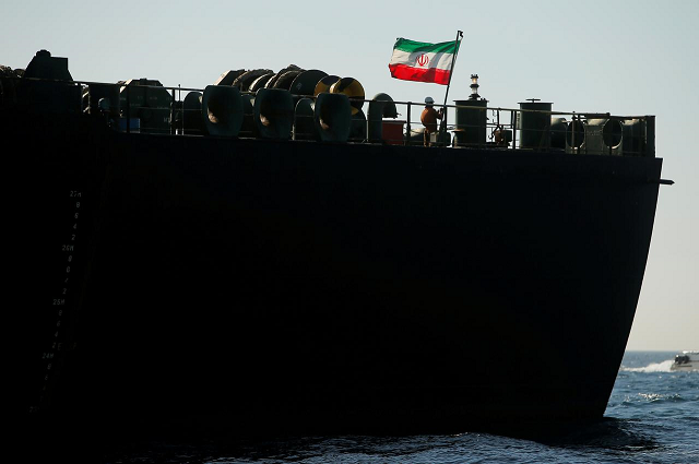 a crew member raises the iranian flag on iranian oil tanker adrian darya 1 previously named grace 1 as it sits anchored after the supreme court of the british territory lifted its detention order in the strait of gibraltar spain photo reuters a crew member raises the iranian flag on iranian oil tanker adrian darya 1 previously named grace 1 as it sits anchored after the supreme court of the british territory lifted its detention order in the strait of gibraltar spain photo reuters