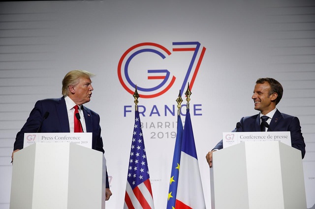 french president emmanuel macron and us president donald trump attend a joint press conference at the end of the g7 summit in biarritz france august 26 2019 photo reuters