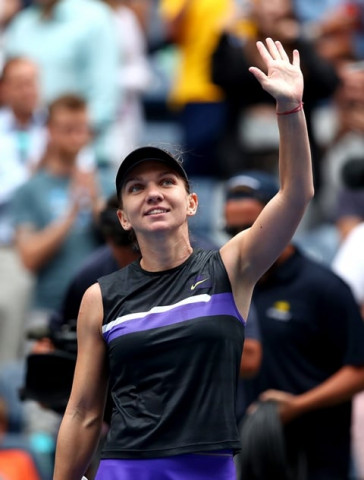 halep could become the world number one by winning the us open title and could chase for the year end number one ranking she held last year photo afp