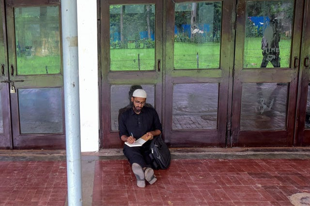 in this photo taken on july 15 2019 hojaifa al mamduh a former madrasa student who is now studying journalism at a dhaka university poses for a photo in dhaka photo afp in this photo taken on july 15 2019 hojaifa al mamduh a former madrasa student who is now studying journalism at a dhaka university poses for a photo in dhaka photo afp