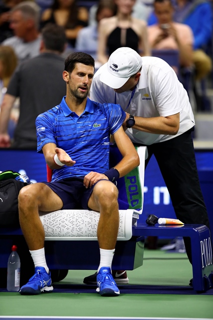 the world number one received medical treatment to his left shoulder throughout the match on his way to a 6 4 7 6 7 3 6 1 win and said he feared the injury could have forced him to retire photo afp