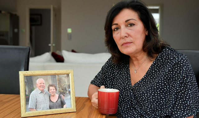 anna amato sits for a portrait next to a photograph of her parents mario and chiara at her home in bristol britain photo reuters