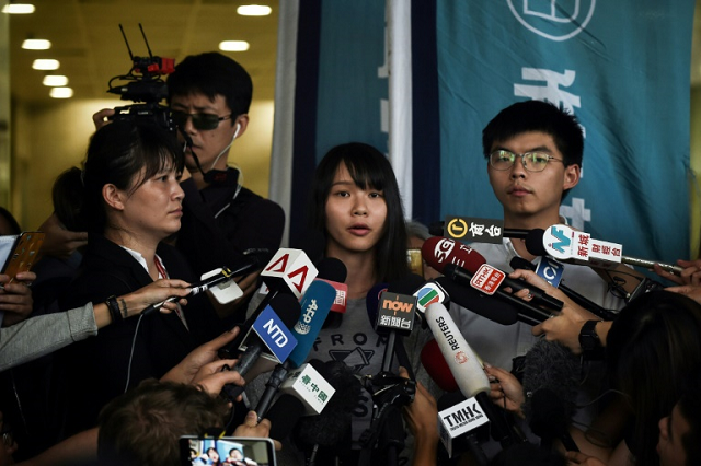joshua wong and agnes chow two of the umbrella movement 039 s leaders are still well regarded among the hong kong youth photo afp joshua wong and agnes chow two of the umbrella movement 039 s leaders are still well regarded among the hong kong youth photo afp