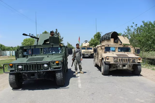 afghan security forces keep watch during fighting with the taliban in kunduz in may 2017 photo afp afghan security forces keep watch during fighting with the taliban in kunduz in may 2017 photo afp