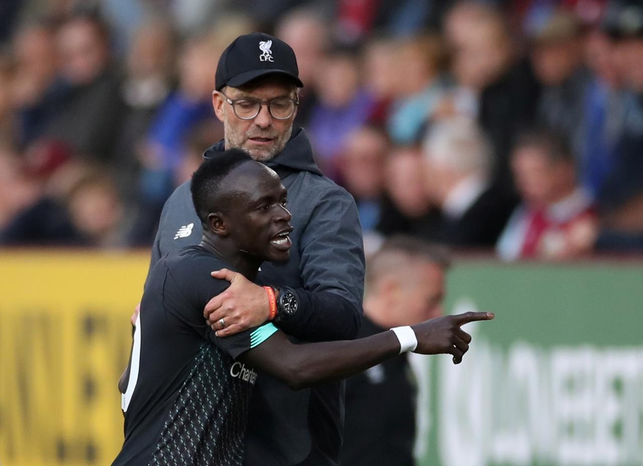 the european champions struggled in pre season losing three times as they had to cope largely without mohamed salah roberto firmino and sadio mane after their participation in international tournaments during the summer photo afp