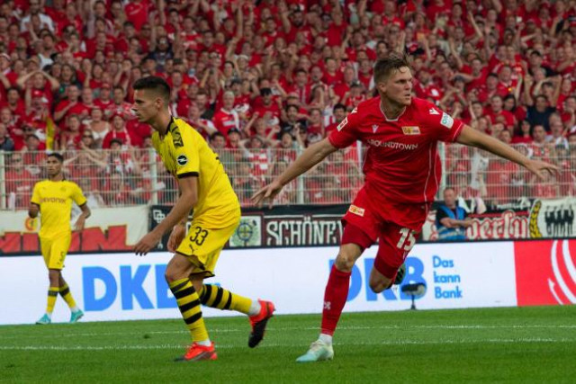 dortmund came into the match heavily favoured to win and reclaim their place on top of the table but struggled to match union 039 s enthusiasm in sweltering conditions in the german capital photo afp dortmund came into the match heavily favoured to win and reclaim their place on top of the table but struggled to match union 039 s enthusiasm in sweltering conditions in the german capital photo afp