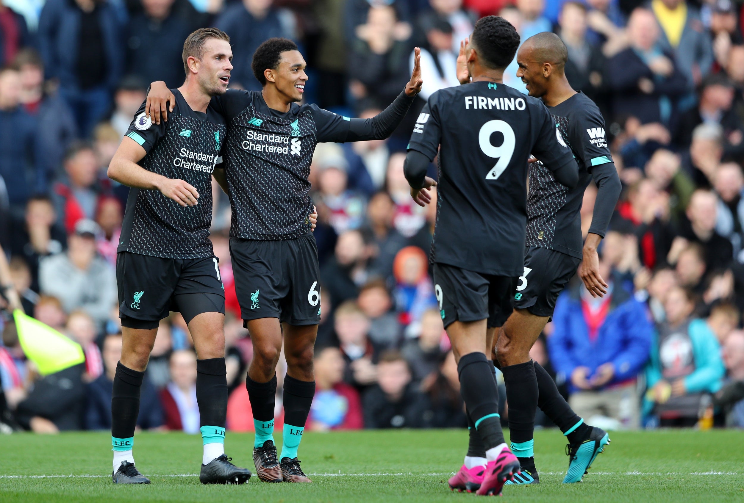 trent alexander arnold 039 s cross looped in off chris wood for a fortunate opener but burnley were masters of their own downfall for the second as ben mee presented the ball to roberto firmino and the brazilian teed up sadio mane to slot home photo afp