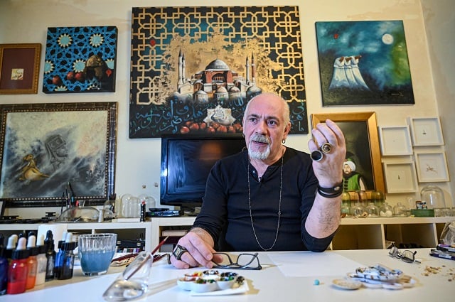 turkey 039 s micro artist hasan kale gestures as he speaks during an interview in istanbul on august 23 2019 photo afp