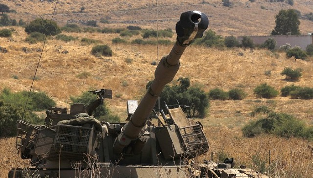 an israeli self propelled artillery gun is positioned near the lebanese border on the outskirts of kiryat shemona israel september 1 2019 photo afp