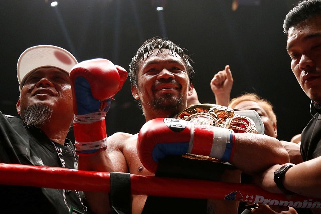 manny pacquiao celebrates after winning a bout against lucas matthysse at the axiata arena kuala lumpur malaysia july 15 2018 photo reuters