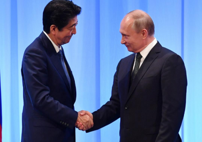 japan s abe says he plans to meet with putin in russia this week