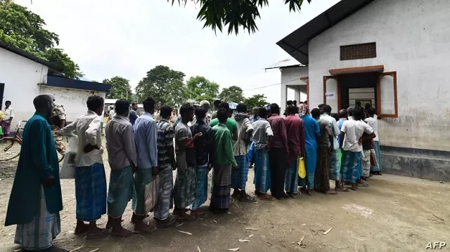 assam residents stand in line to check if their names are included on the final list of the national register of citizens photo afp assam residents stand in line to check if their names are included on the final list of the national register of citizens photo afp