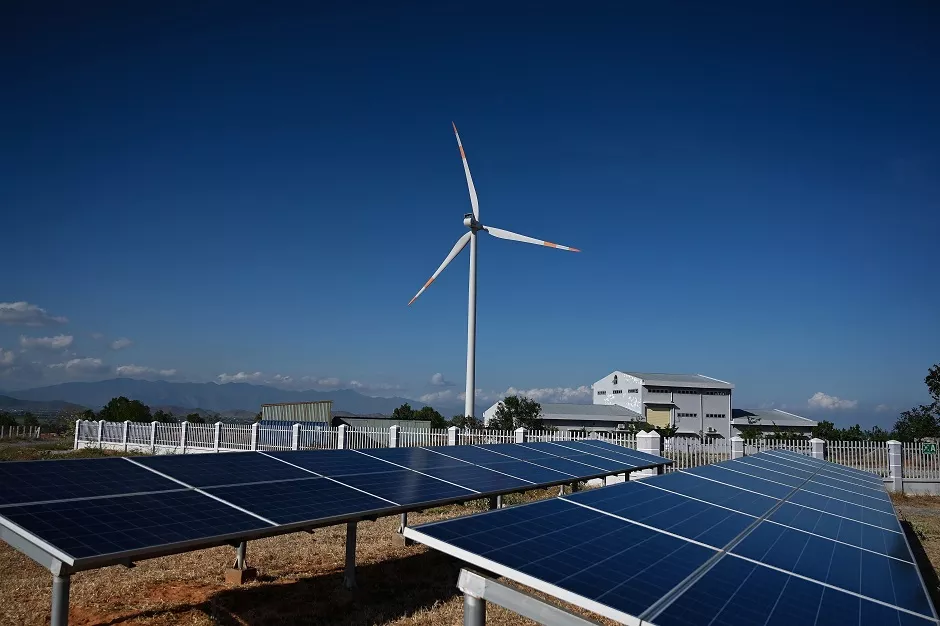 solar panel installations and a wind turbine at the phu lac wind farm in southern vietnam 039 s binh thuan province photo afp solar panel installations and a wind turbine at the phu lac wind farm in southern vietnam 039 s binh thuan province photo afp