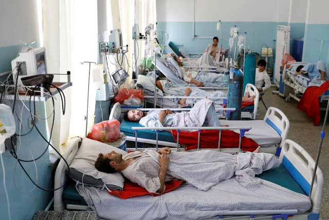 injured men receive treatment at the hospital after a blast in kabul afghanistan photo reuters