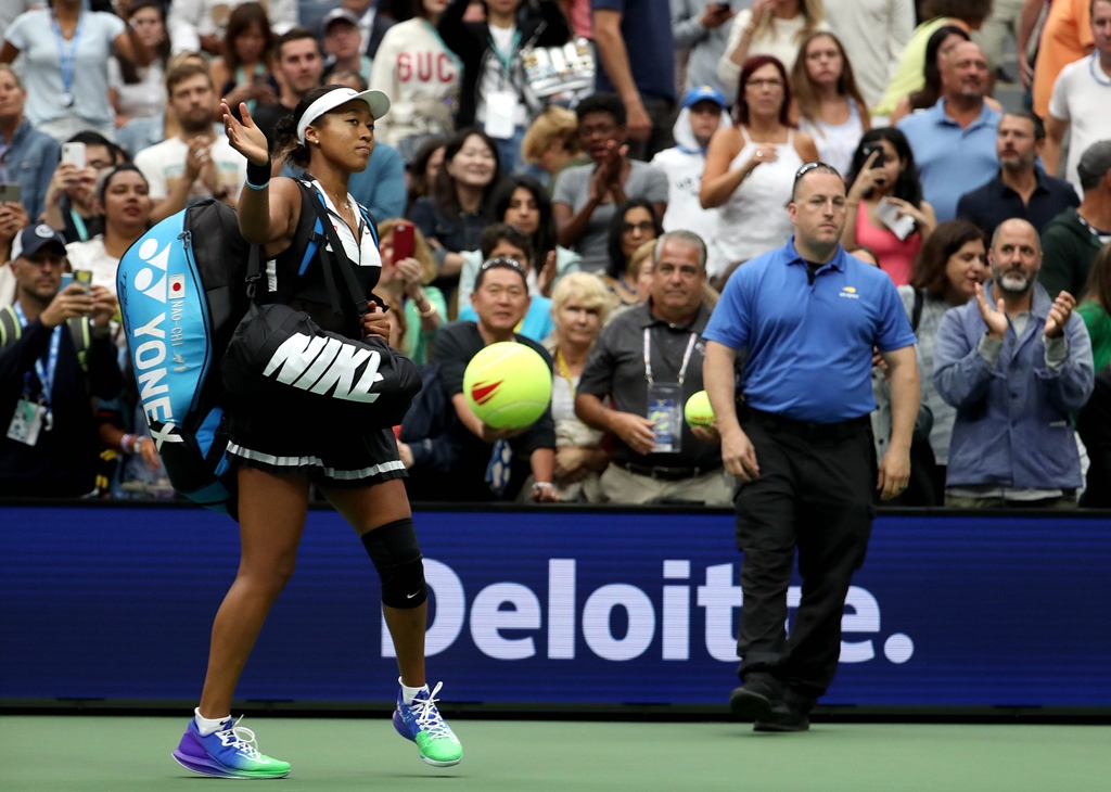 realisations osaka admitss to a sore knee that bothered her for the past two weeks and that she is coming to realize how well she must play when she is less than at her best photo afp