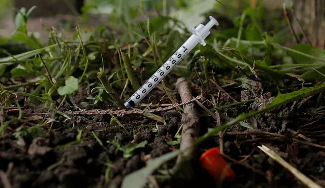 a used needle sits on the ground in a park in lawrence massachusetts us photo reuters a used needle sits on the ground in a park in lawrence massachusetts us photo reuters