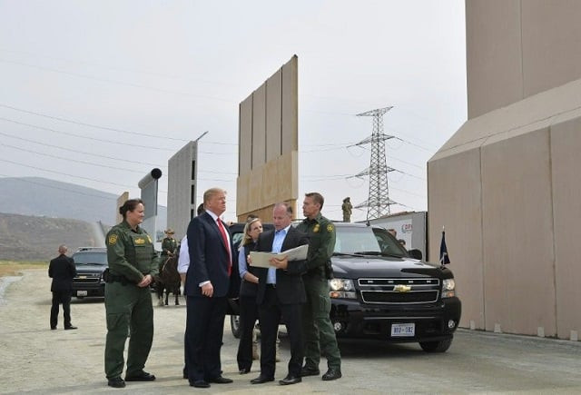us president donald trump inspects border wall prototypes in san diego california on march 13 2018 photo afp us president donald trump inspects border wall prototypes in san diego california on march 13 2018 photo afp