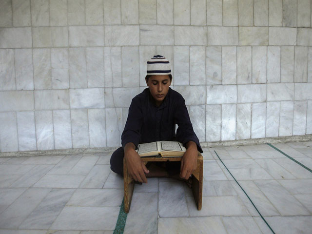 over 2 5 million children are studying in 30 000 madrassas across the country photo reuters