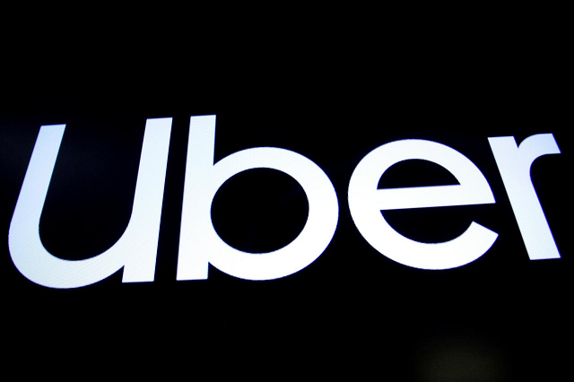 a screen displays the company logo for uber on the day of its ipo at the new york stock exchange in new york us may 10 2019 photo reuters a screen displays the company logo for uber on the day of its ipo at the new york stock exchange in new york us may 10 2019 photo reuters