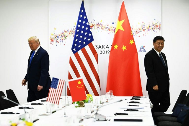 the world 039 s two biggest economies have been embroiled in a tense year long trade war photo afp