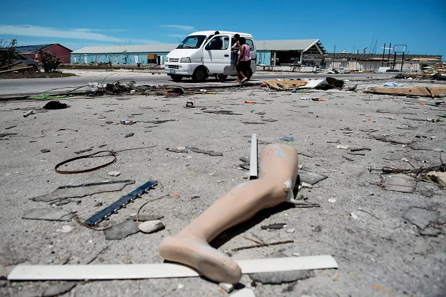the leg of a dismantled mannequin is seen next to damage caused by hurricane dorian on september 5 2019 in marsh harbour great abaco island in the bahamas photo afp the leg of a dismantled mannequin is seen next to damage caused by hurricane dorian on september 5 2019 in marsh harbour great abaco island in the bahamas photo afp
