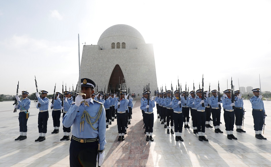 members of the pakistan air force change their positions at the mausoleum of muhammad ali jinnah during the defence day ceremonies or pakistan 039 s memorial day to express solidarity with the people of kashmir in karachi photo reuters