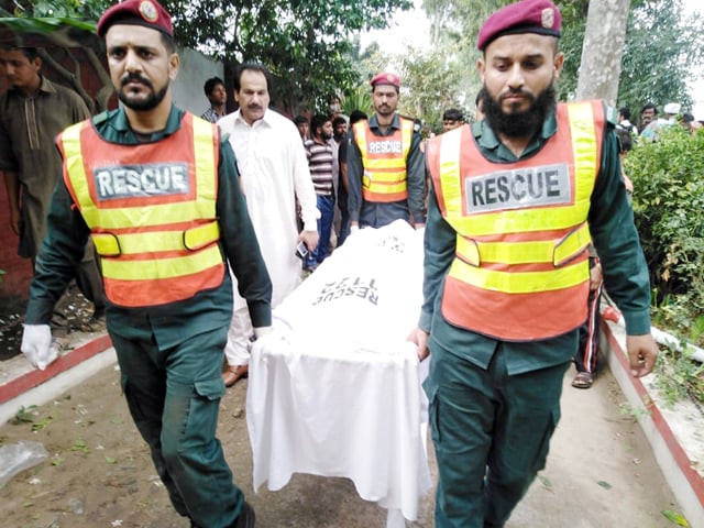 rescue officials shift body of a victim to a hospital in narowal on friday photo nni rescue officials shift body of a victim to a hospital in narowal on friday photo nni